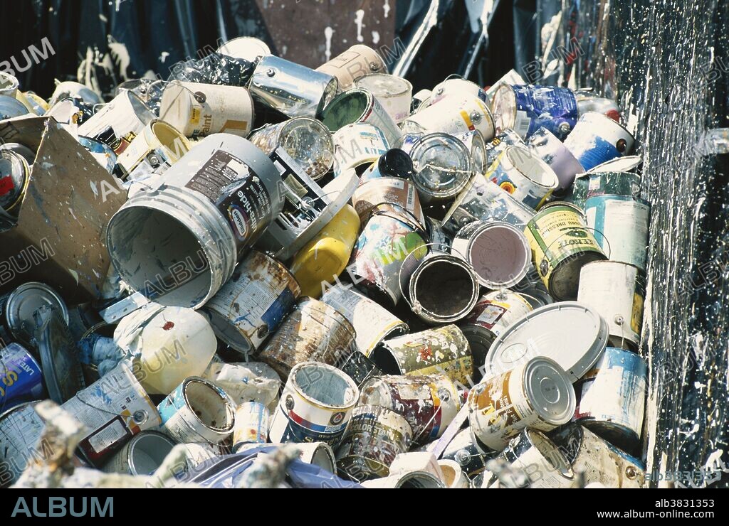 Hazardous household items such lead paint cans at a recycling/disposal center.
