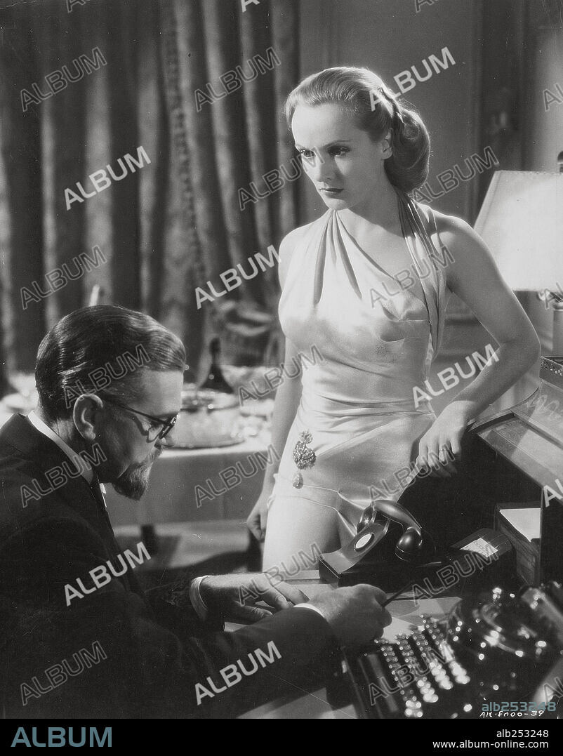 CAROLE LOMBARD and SIG RUMANN in TO BE OR NOT TO BE, 1942, directed by ERNST LUBITSCH. Copyright UNITED ARTISTS.