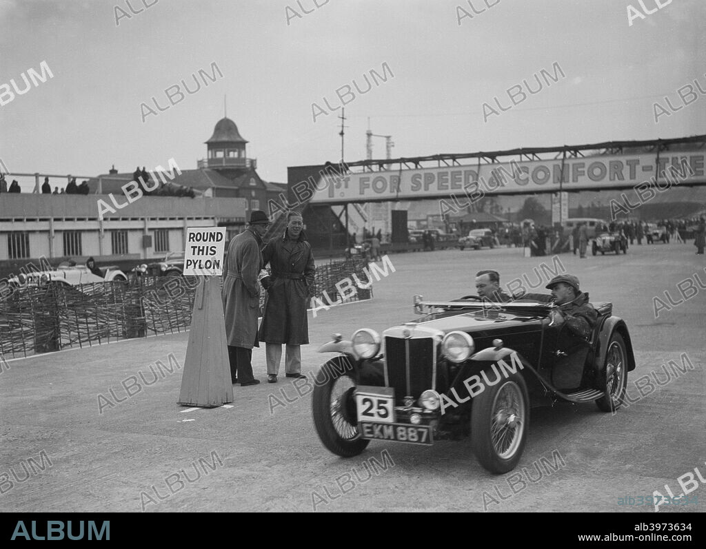 MG TA 1937 1292 cc. Vehicle Reg. No.  EKM887.  Event Entry No: 25. Place: Brooklands.  J.C.C. Rally. Date: 25.3.39.