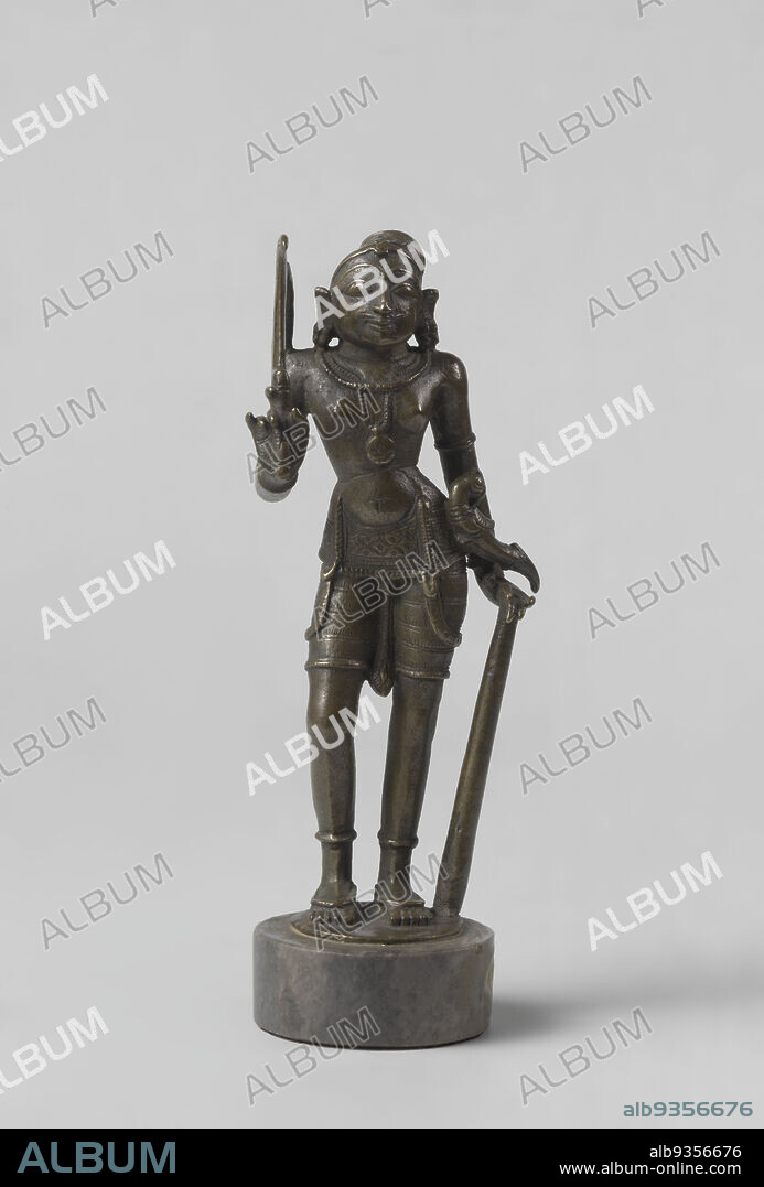 Karuppannasamy, Karuppannasamy (also known as Karuppu, Karuppar or Karuppannaswamy), a local god of South India, helper of Aiyanar and protector of the village, stands upright, his right leg slightly bent at the knee. He rests his left hand on a club. In his raised right hand he holds a sickle (Tamil: arival). From his left hip hangs a knife with scabbard, its handle shaped like a parakeet., maker: anonymous, Tamil Nadu, c. 1600 - c. 1700, bronze (metal), casting, height 16.8 cm × width 6.4 cm × depth 3.6 cm.