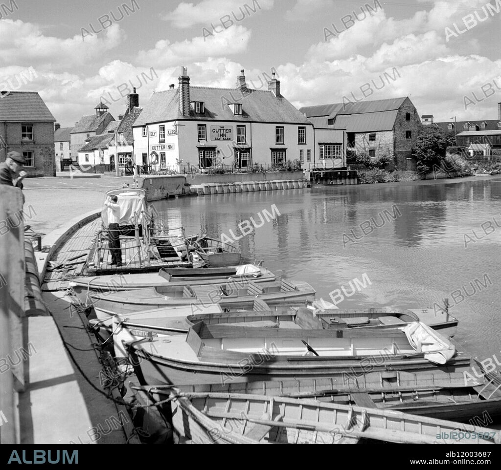 On the Great River Ouse along side the Cutter Inn at Ely , Cambridgeshire , England . 1960 ' s.