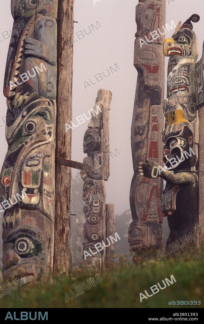 Totems guard the Nimpkish Tribe burial grounds. Cormorant Island, Alert Bay, British Columbia, Canada.