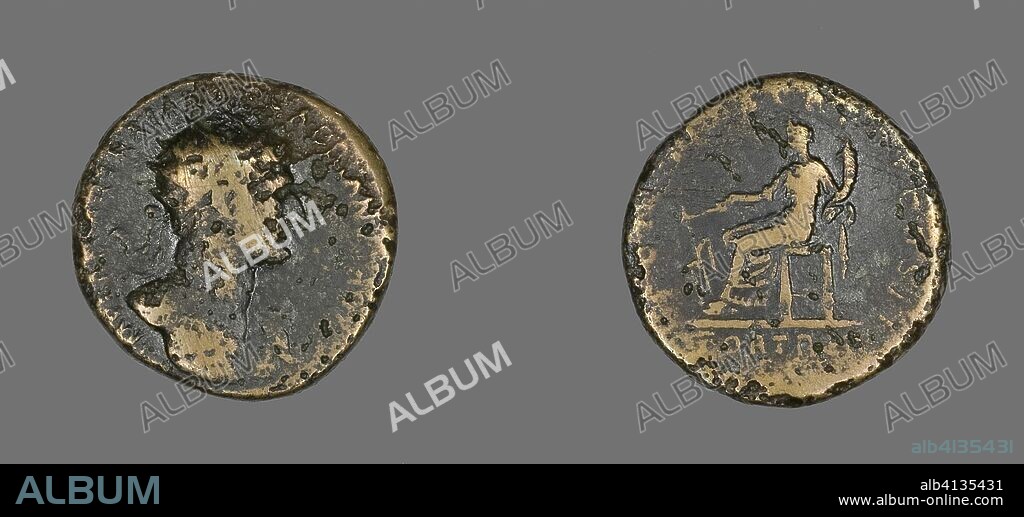 ANCIENT ROMAN. Dupondius (Coin) Portraying Emperor Hadrian. Roman. Date: 117 AD-138 AD. Dimensions: Diam. 2.7 cm; 13.97 g. Bronze. Origin: Roman Empire.