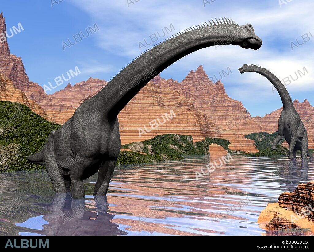 Two Brachiosaurus dinosaurs in water next to red rock mountains on a beautiful day.