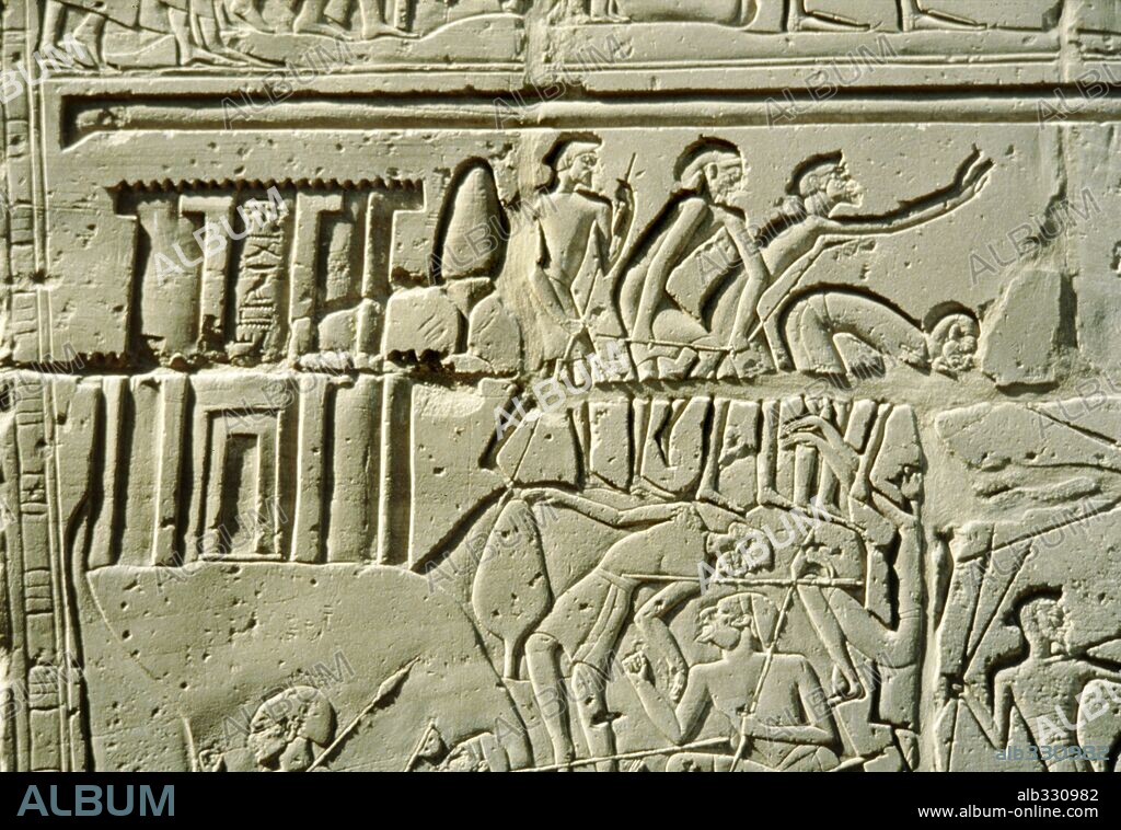 Relief of Battle of Kadesh showing Pharaoh Rameses II in chariot fighting Hittite enemy of King Muwatallis, 1294 BC. Karnak Luxor Egypt.