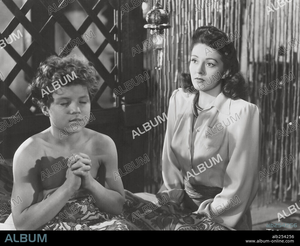 JOHNNY SHEFFIELD and NANCY KELLY in TARZAN'S DESERT MYSTERY, 1943, directed by WILHELM THIELE. Copyright RKO.