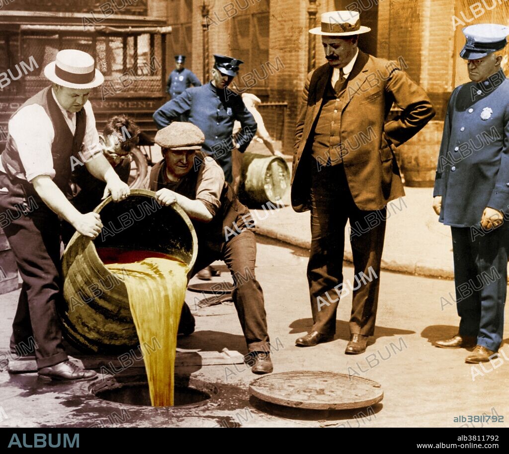 New York City Deputy Police Commissioner John A. Leach, right, watching agents pour liquor into sewer following a raid during the height of prohibition. Prohibition in the United States was a nationwide Constitutional ban on the sale, production, importation, and transportation of alcoholic beverages that remained in place from 1920 to 1933. It was promoted by dry crusaders movement, led by rural Protestants and social Progressives in the Democratic and Republican parties, and was coordinated by the Anti-Saloon League. Prohibition was mandated under the Eighteenth Amendment to the U.S. Constitution. Enabling legislation, known as the Volstead Act, set down the rules for enforcing the ban and defined the types of alcoholic beverages that were prohibited. Private ownership and consumption of alcohol was not made illegal under federal law; however, in many areas local laws were more strict, with some states banning possession outright. Prohibition supporters, called drys, presented it as a victory for public morals and health. Anti-prohibitionists, known as wets, criticized the alcohol ban as an intrusion of mainly rural Protestant ideals on a central aspect of urban, immigrant, and Catholic life. Nationwide Prohibition ended with the ratification of the Twenty-first Amendment, which repealed the Eighteenth Amendment, on December 5, 1933. Undated, no photographer credited.