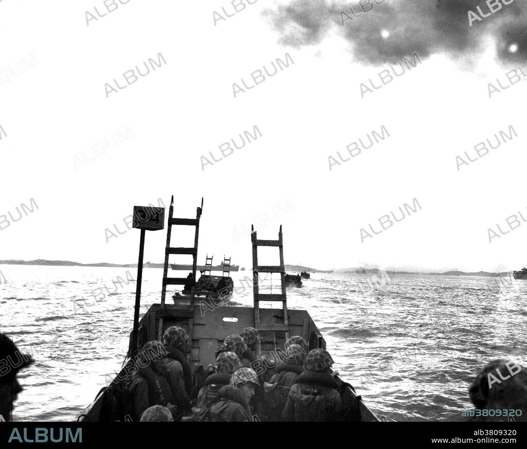 Captioned: "Carrying scaling ladders, U.S. Marines in landing crafts head for the seawall at Inchon." The Battle of Inchon was an amphibious invasion and battle of the Korean War that resulted in a decisive victory and strategic reversal in favor of the United Nations. The operation involved some 75,000 troops and 261 naval vessels, and led to the recapture of the South Korea capital Seoul two weeks later. The code name for the operation was Operation Chromite. The battle began on September 15, 1950 and ended on September 19. The battle ended a string of victories by the invading North Korean People's Army (NKPA). The subsequent UN recapture of Seoul partially severed NKPA's supply lines in South Korea. The majority of United Nations ground forces involved were U.S. Marines, commanded by General of the Army Douglas MacArthur of the U.S. Army. MacArthur was the driving force behind the operation, overcoming the strong misgivings of more cautious generals to a risky assault over extremely unfavorable terrain. Photograph credited to Staff Sergeant W. W. Frank, USMC, September 15, 1950.