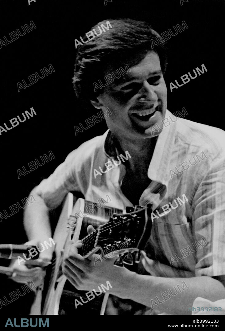 John McLaughlin,  jazz guitarist, bandleader and composer, London , 1976.