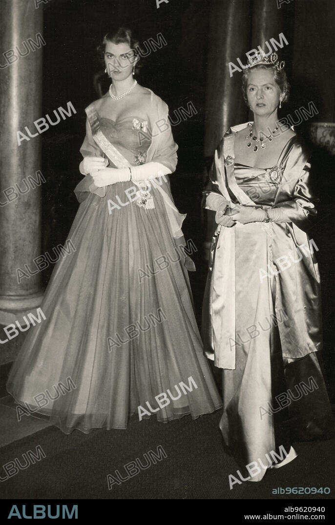 Princesses Margaretha and Sibylla of Sweden, 1954. Princess Sibylla (1908-1972), wife of Prince Gustaf Adolf, Duke of Västerbotten, and their eldest daughter, Princess Margaretha (1934-), on the way to a gala dinner at Stockholm Castle. From the Svenskt Fotoreportages collection.