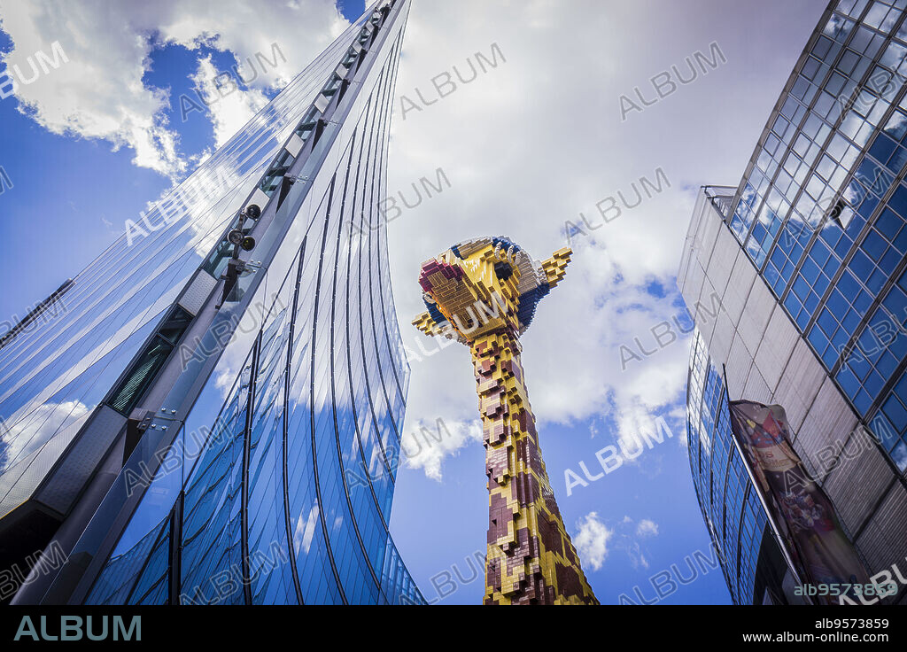 giant giraffe built with Lego pieces, Potsdamer Platz buildings, Berlin, germany, europe.