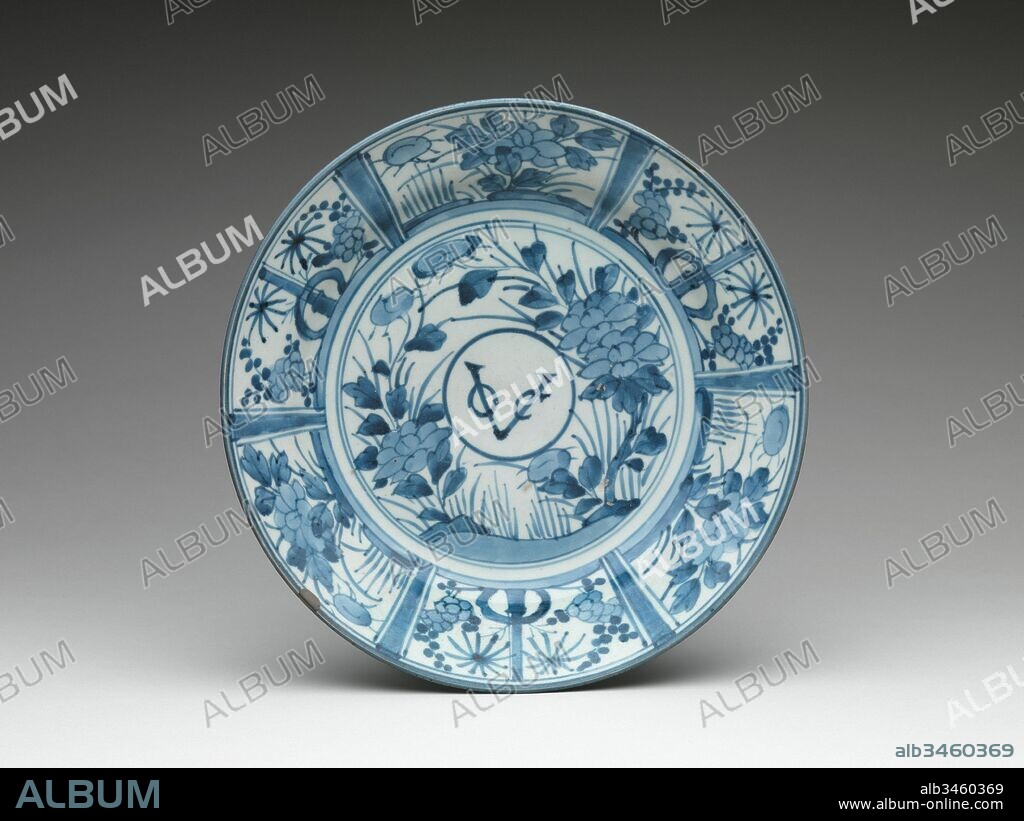 Plate with Monogram of the Dutch East India Company, Edo period (1615–1868), ca. 1660, Japan, Underglaze blue (Arita ware), H. 2 3/8 in. (6 cm); Diam. 12 3/8 in. (31.4 cm); Diam. of foot (6 3/8 in. (16.2 cm), Ceramics, This porcelain dish is emblazoned with the monogram VOC, which stands for the Vereenigde Oost-Indische Compagnie, the Dutch East India Company. During most of the Edo period (1615–1868), the Dutch were the only Europeans allowed to trade with Japan.
