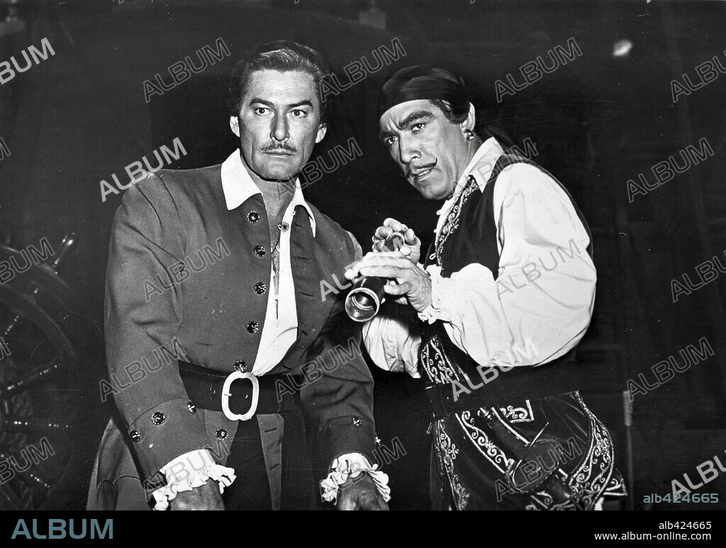 ANTHONY QUINN and ERROL FLYNN in AGAINST ALL FLAGS, 1952. Copyright UNIVERSAL INTERNATIONAL.