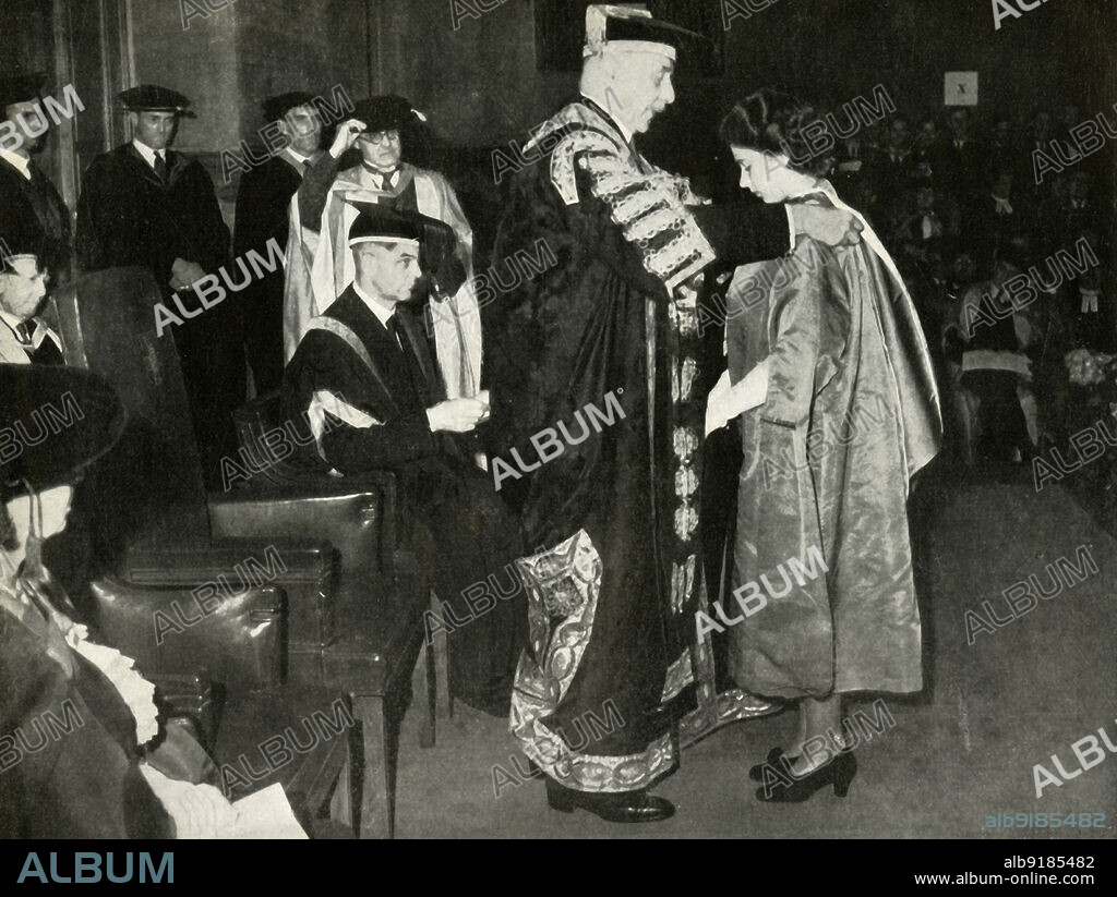 Bachelor of Music', 10 July 1946, (1947). Princess Elizabeth (future Queen Elizabeth II) receives the honorary degree of Bachelor of Music at the London University. 'The Chancellor, the Earl of Athlone, admits his great-niece to the degree'. From "Princess Elizabeth: The Illustrated Story of Twenty-one Years in the Life of the Heir Presumptive", by Dermot Morrah. [Odhams Press Limited, London, 1947].