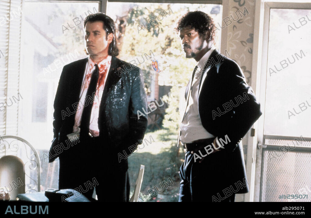 JOHN TRAVOLTA and SAMUEL L. JACKSON in PULP FICTION, 1994, directed by QUENTIN TARANTINO. Copyright MIRAMAX.
