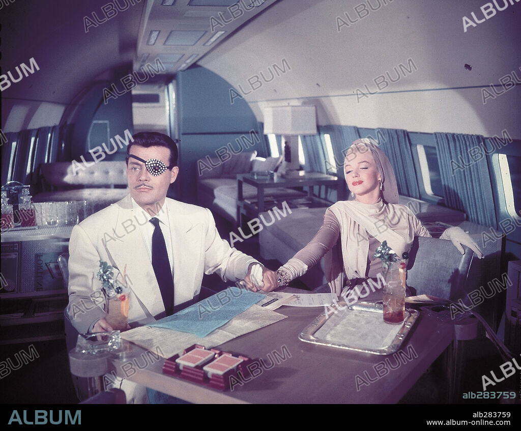 NORMA JEAN BAKER und ROY D'ARCY. MARILYN MONROE und ROY D'ARCY in HOW TO MARRY A MILLIONAIRE, 1953, unter der Regie von JEAN NEGULESCO. Copyright 20TH CENTURY FOX.