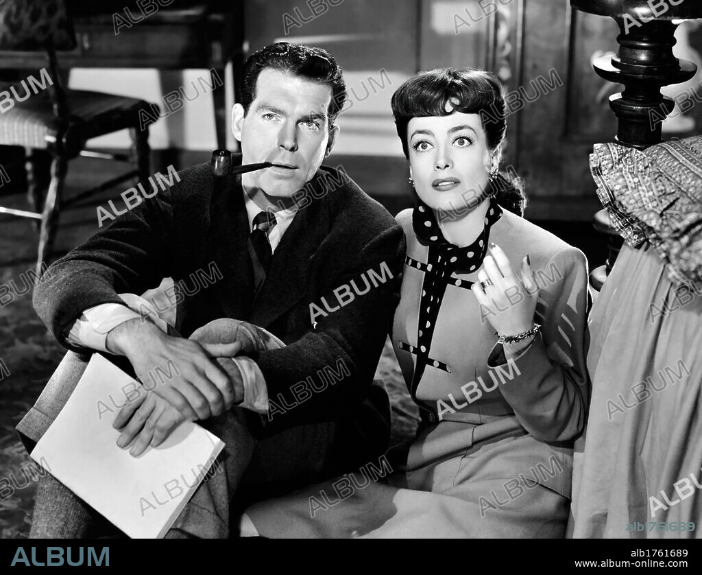FRED MACMURRAY and JOAN CRAWFORD in ABOVE SUSPICION, 1943, directed by RICHARD THORPE. Copyright M.G.M.