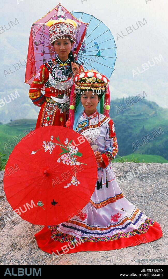 The Zhuang people (Chinese: ??; pinyin: Zhuàngzú; Zhuang: Bouxcuengh) are an ethnic group who mostly live in the Guangxi Zhuang Autonomous Region in southern China. Some also live in the Yunnan, Guangdong, Guizhou and Hunan provinces. They form one of the 55 minority ethnic groups officially recognized by the People's Republic of China. With the Buyi, Tay–Nùng, and other northern Tai speakers, they are sometimes known as the Rau or Rao. Their population, estimated at 18 million people, puts them second only to the Han Chinese and makes the Zhuang the largest minority in China. Longji (Dragon's Backbone) Terraced Rice Fields received their name because the rice terraces resemble a dragon's scales, while the summit of the mountain range looks like the backbone of the dragon. Visitors standing on the top of the mountain can see the dragon's backbone twisting off into the distance.