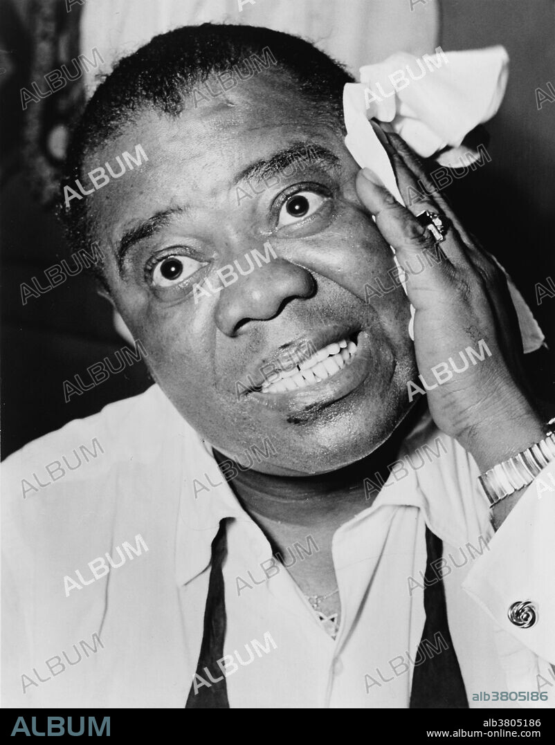 Louis Armstrong (August 4, 1901 - July 6, 1971) was an American jazz trumpeter and singer. One of the most famous musicians of the Harlem Renaissance he was born into a poor New Orleans family. He began to perform with bands in small clubs, and play at funerals and parades around town. In 1922 he was invited to move to Chicago, to play the second cornet in a Creole Jazz Band. Two years later, Armstrong moved to New York City, and began playing his music with the Fletcher Henderson Orchestra at the Roseland Ballroom. In 1929, he made his first appearance on the Broadway stage. In 1942, he married a dancer from the Cotton Club, where his band had performed many times. All throughout the 1950's and 60's, Armstrong appeared in films and made many international tours. He is one of the most appreciated jazz artists of the Harlem Renaissance, and of all times. People learned to appreciate both jazz, and African-American music even more, because of this man. Renowned for his charismatic stage presence and voice almost as much as for his trumpet playing, his influence extended well beyond jazz music. His artistry and personality allowed him socially acceptable access to the upper echelons of American society that were highly restricted for a black man. Armstrong played music up until the day he died at 70 years old, on July 6, 1971. Photographed by Herman Hiller, 1953.