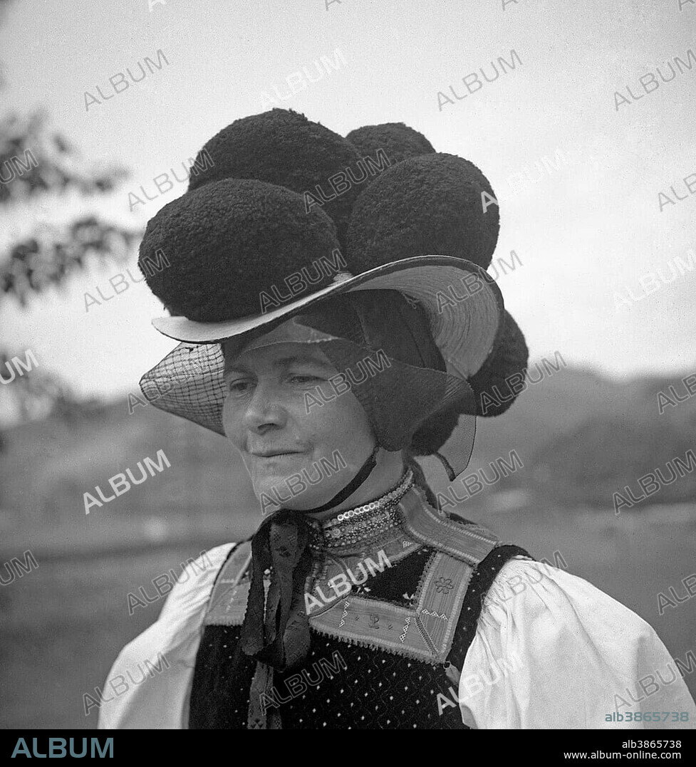 Woman in traditional traditional costume with hat, celebration, around 1950, surroundings of Freiburg, Germany, Europe.