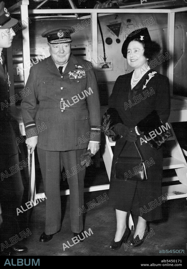 Queen Mother and Churchill at Biggin Hill -- Queen Elizabeth, the Queen Mother, and the Premier, Mr. Winston Churchill in the uniform of Air Commodore, are seen at the Royal air Force station Biggin Hill, Kent, Today. November1, When they inspected 600 (city of London) squadron and 615 (County of Surrey) Squadron.The Queen Mother is honorary Air commodore of 600 squadron and Mr. Churchill is Honorary Air Commodore of 615. November 01, 1952. (Photo by The Associated Press Ltd.).