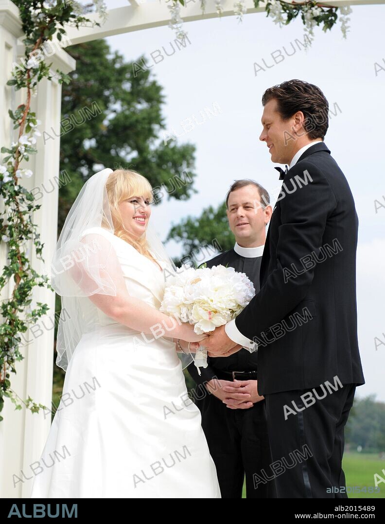 HAYES MACARTHUR and REBEL WILSON in BACHELORETTE, 2012, directed by LESLYE HEADLAND. Copyright Gary Sanchez productions.