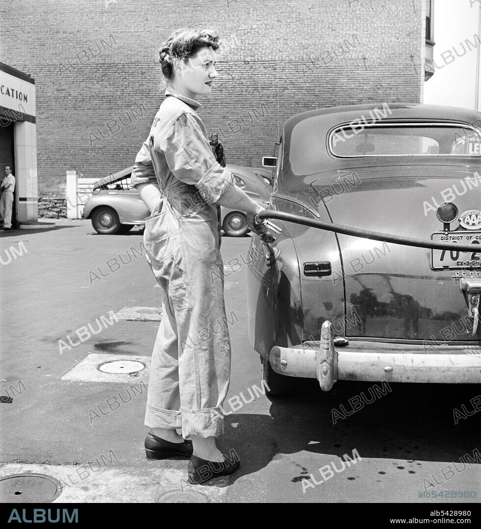 Frances Heisler, Garage Attendant, pumping Gas, Atlantic Refining Company Garage, Philadelphia, Pennsylvania, USA, Jack Delano, U.S. Office of War Information, June 1943.
