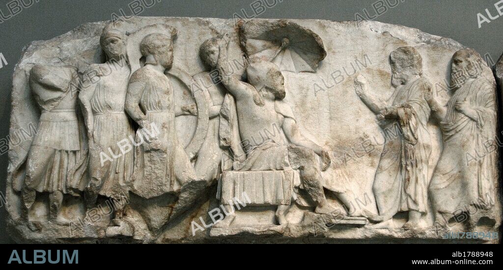 Nereid Monument. Sculptured tomb from Xanthos. Classical period Lycia. Turkey. Arbinas, in Persian dress, recieves emissaries. Upper podium frieze. 390-380 BC. British Museum. London. England. United Kingdom.
