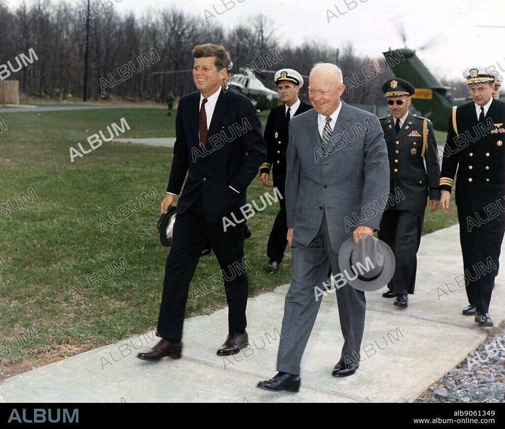 President John Kennedy and Dwight Eisenhower at Camp David, 1962.