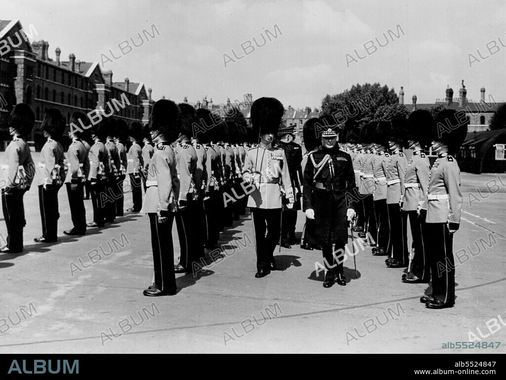 H.R.H. The Duke of Gloucester is seen as he inspects the 2nd Btn. of the Scots Guards at Chelsea Barracks. The Btn. have recently returned from Malaya. August 6, 1952. (Photo by Daily Mail Contract Picture).