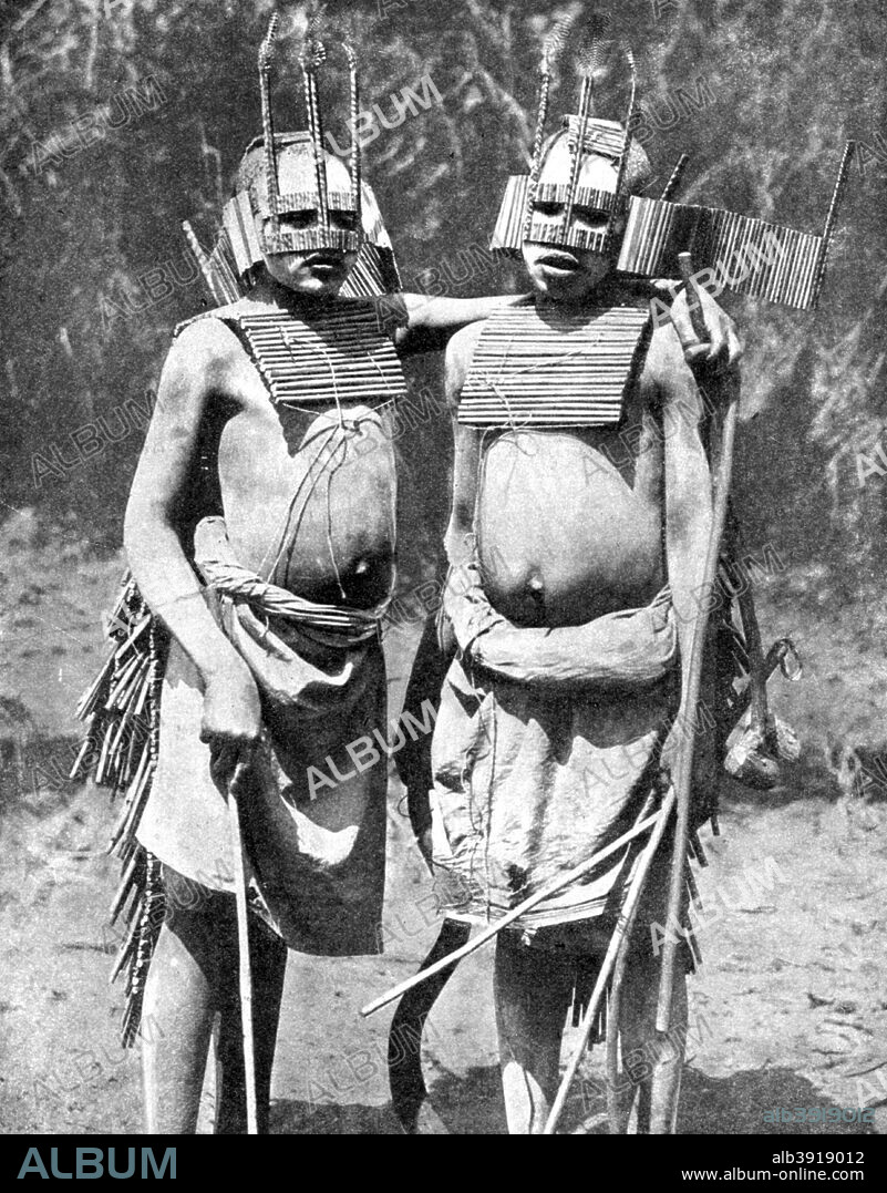 Two witch-doctors, Tanganyika (Tanzania), Africa, 1936. From Peoples of the World in Pictures, edited by Harold Wheeler, published by Odhams Press Ltd (London, 1936).