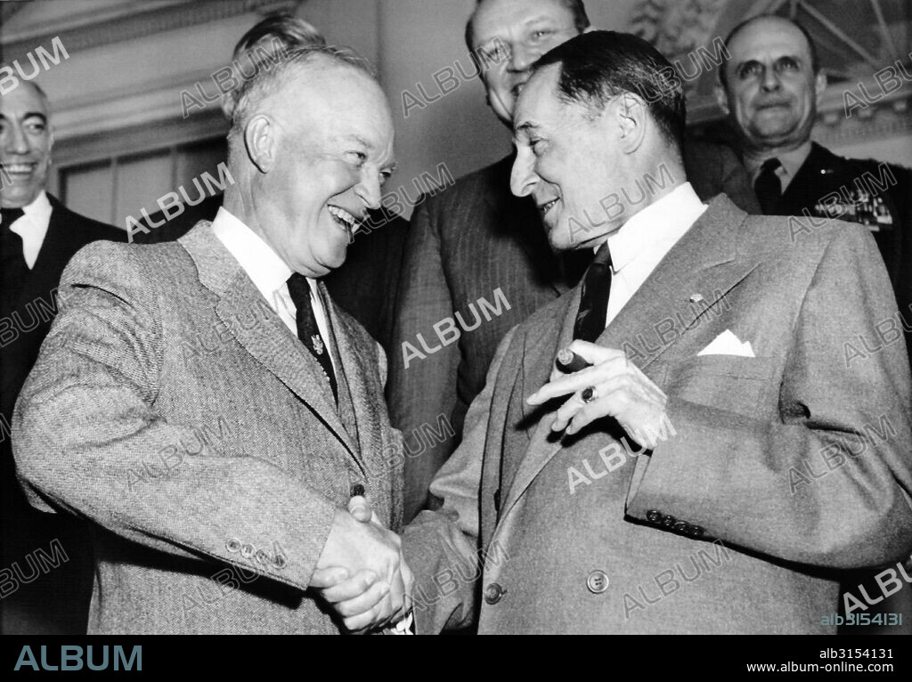 Washington, D.C.:  March 18, 1954 President Dwight D. Eisenhower and Gen. Douglas MacArthur shake hands after having had lunch together at the White House.