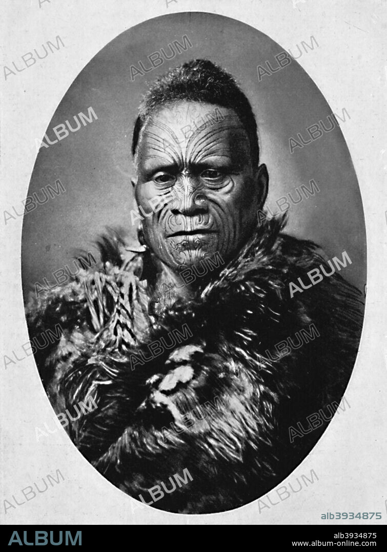 A Maori chief with elaborately tattooed face and weather cloak, 1902. From The Living Races of Mankind, Vol. I. [Hutchinson & Co, London, 1902].