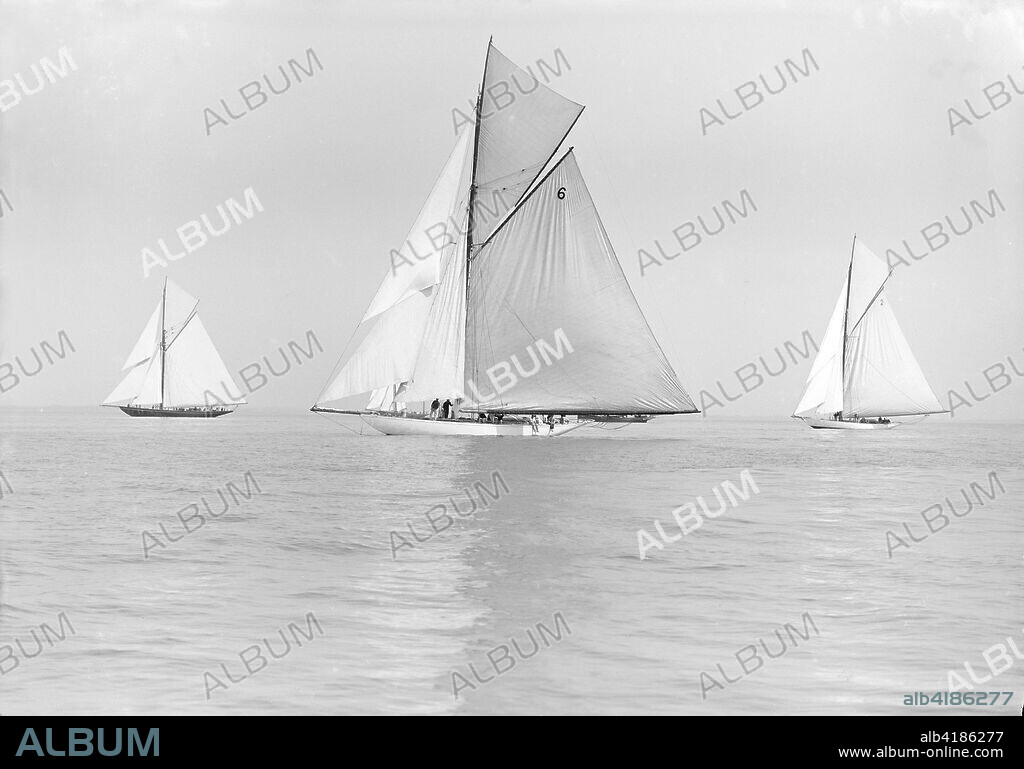 The Big Class yachts 'Britannia', 'Ma'oona', and 'Carina' sailing in light winds, 1913.