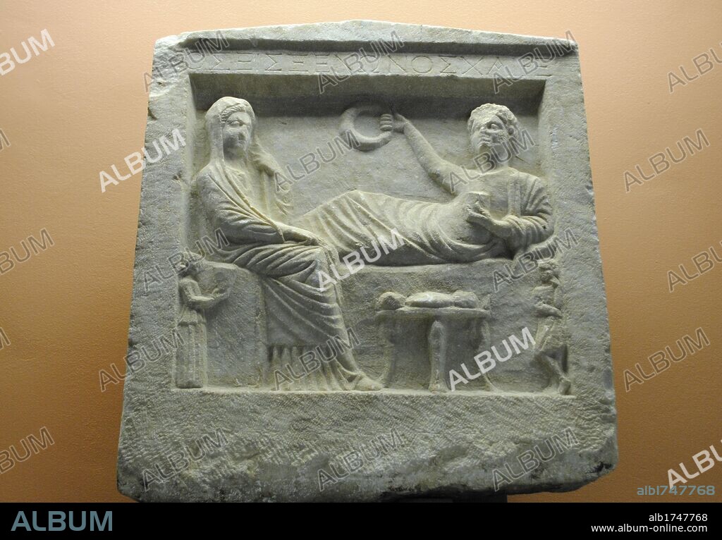 Tombstone. "Parting scene" in relief. Deceased stretched in a triclinium. Dated in the first centuries after Christ. Roman period. From ancient Greek city of Olbia. Archaeological Museum of Odessa. Ukraine.