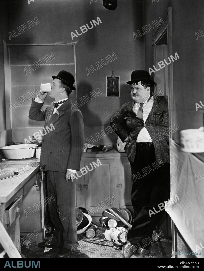 OLIVER HARDY and STAN LAUREL in ONE GOOD TURN, 1931, directed by JAMES W. HORNE. Copyright HAL ROACH/MGM.