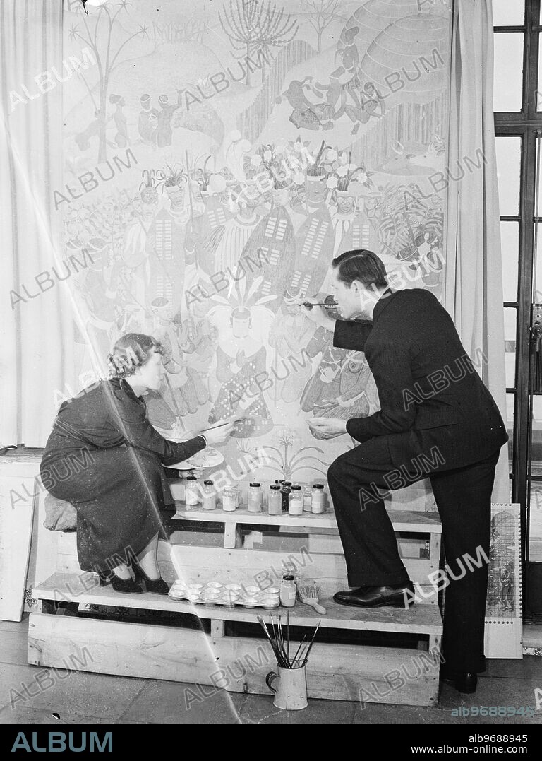 Painting a story . Prize winning art students murals for South Africa House . Miss Eleanor Esmonde White and Mr Le Roux Smith at work on the " Zulu wedding " mural at South Africa House , London . 10 January 1936.