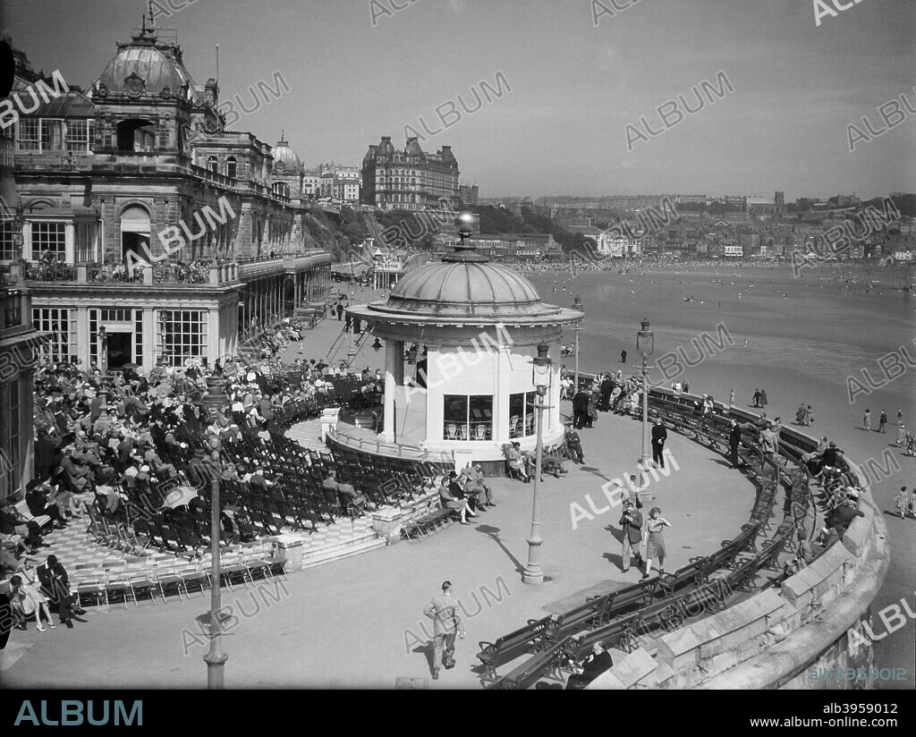 The Spa, South Cliff, Scarborough, North Yorkshire, 1945. Looking north along The Spa with its bandstand. Also visible are the Grand Hotel and South Sands.