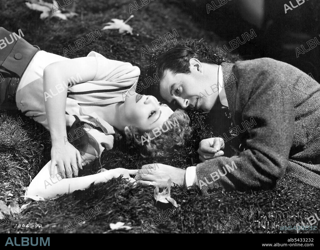 CLAUDETTE COLBERT and RAY MILLAND in ARISE, MY LOVE, 1940, directed by MITCHELL LEISEN. Copyright PARAMOUNT PICTURES.