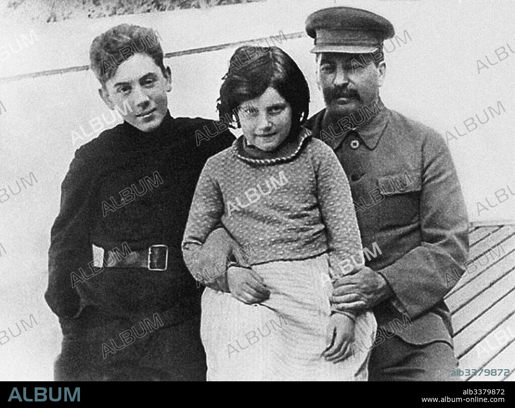 NIKOLAY VLASIK. Josef Stalin with daughter Svetlana and son Vasily (1921-1962).