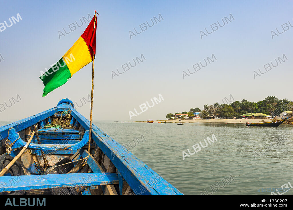 Guinean flag on a boat, Conakry, Republic of Guinea, West Africa, Africa.