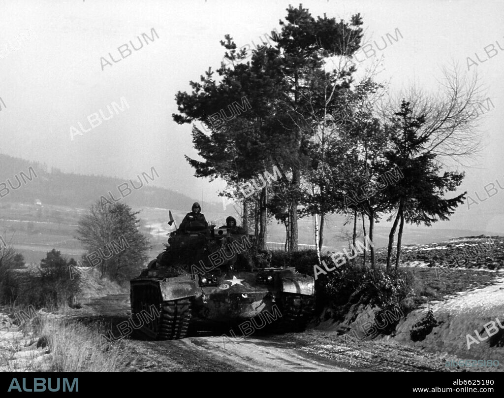 A tank of the US army during the big winter manoeuvre "Free Play" of the US army on the military training area Grafenwöhr on 5 February 1959. The highlight of the manoeuvre, in which around 60.000 soldiers participated, was the simulation of a nuclear attack observed from the "Feldherrenhügel" by about 40 NATO generals. 05/02/1959
