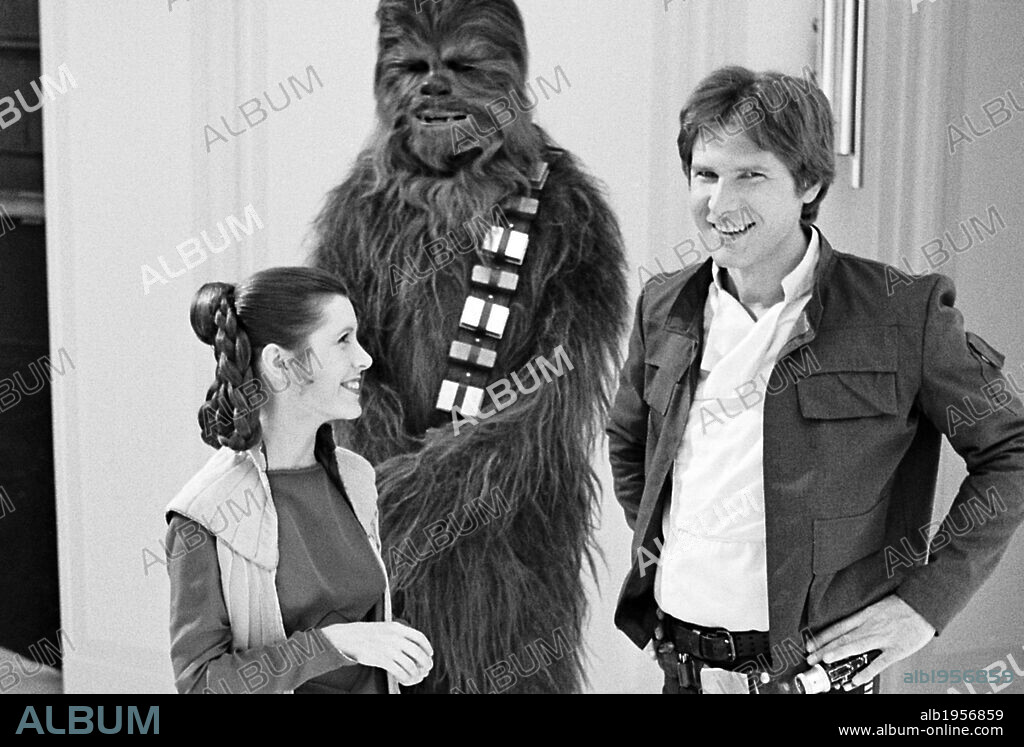 CARRIE FISHER, HARRISON FORD and PETER MAYHEW in STAR WARS: EPISODE V-THE EMPIRE STRIKES BACK, 1980, directed by IRVIN KERSHNER. Copyright LUCASFILM/20TH CENTURY FOX.