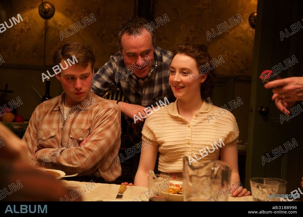 EMORY COHEN, JOHN CROWLEY and SAOIRSE RONAN in BROOKLYN, 2015, directed by JOHN CROWLEY. Copyright WILDGAZE FILMS.