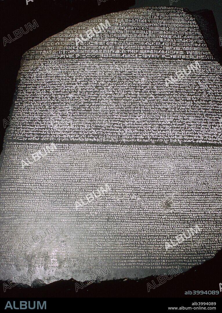 The Rosetta Stone, showing hieroglyphs, demotic, and Greek scripts, Egyptian, Ptolemaic Period, 196 BC. The inscription is a priestly decree affirming the royal cult of the 13-year-old Ptolemy V. From the British Museum's collection.