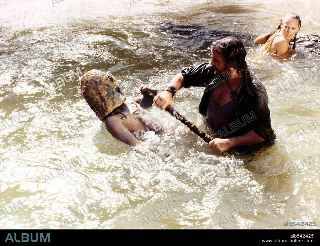STACY KEACH and URSULA ANDRESS in PRISIONER OF THE CANNIBAL GOD, 1978 (LA MONTAGNA DEL DIO CANNIBALE), directed by SERGIO MARTINO. Copyright MEDUSA.