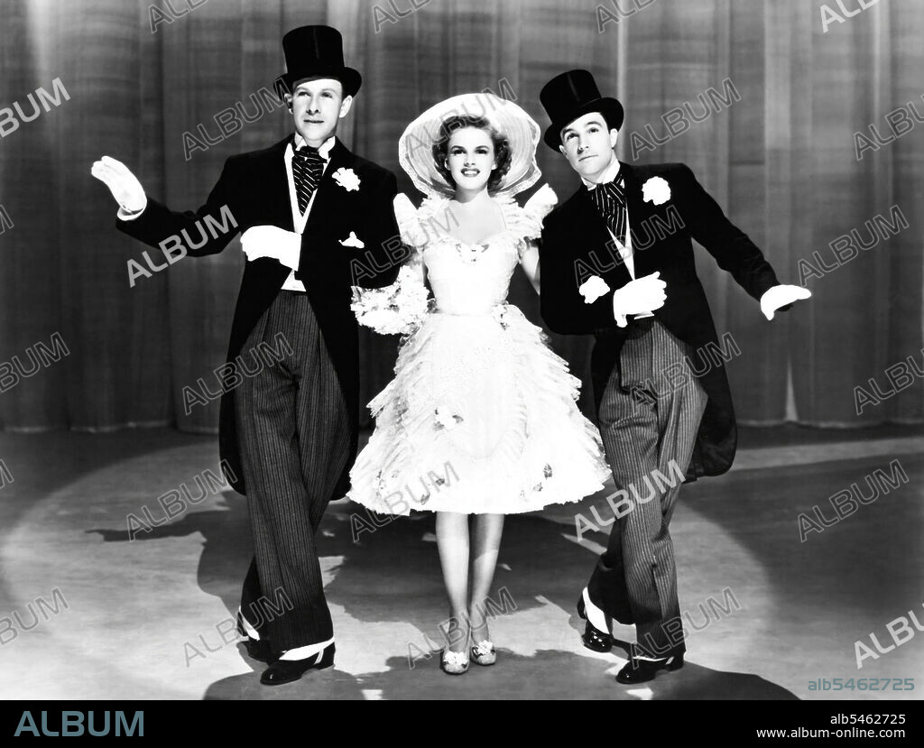 GENE KELLY, GEORGE MURPHY and JUDY GARLAND in FOR ME AND MY GAL, 1942, directed by BUSBY BERKELEY. Copyright M.G.M.