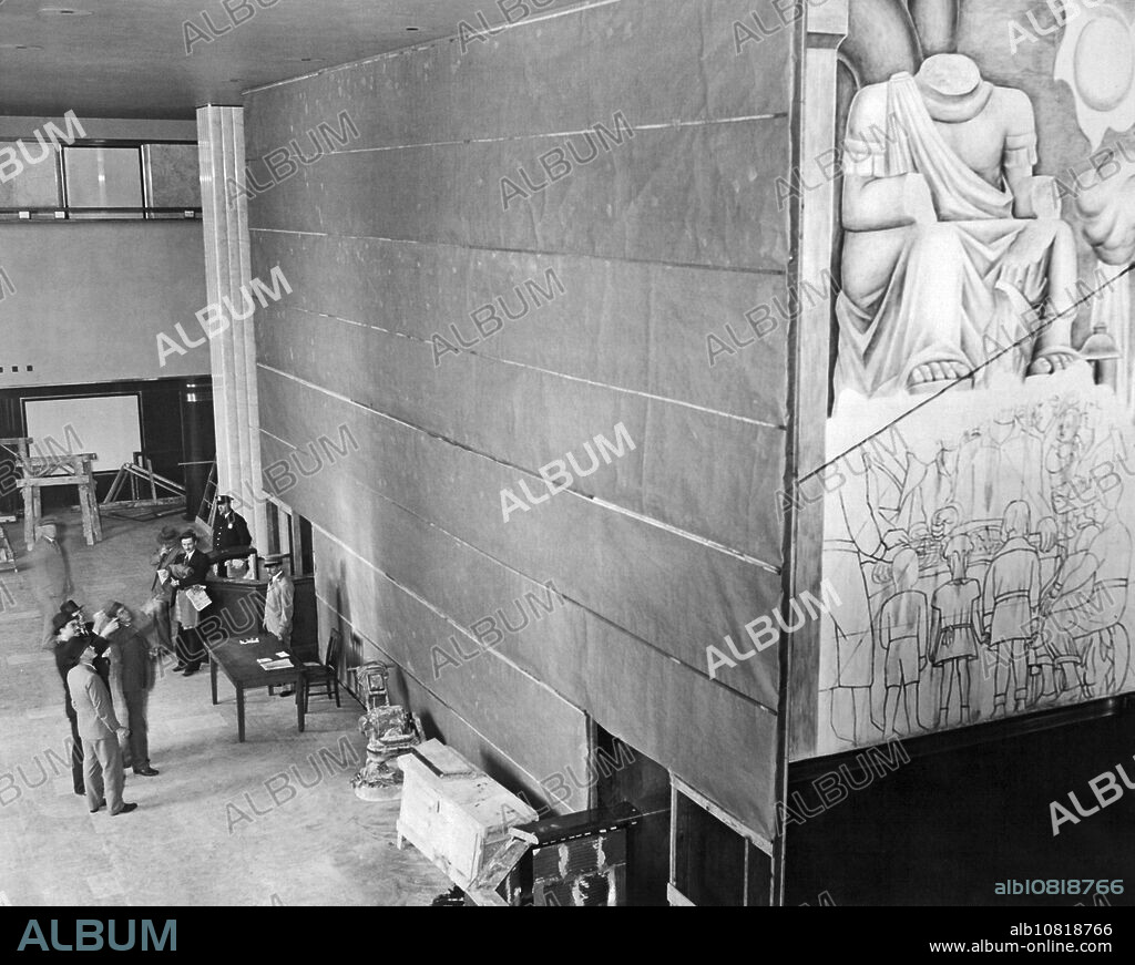 New York, New York, May 10, 1933 A large burlap screen hides from view the partly finished paintings on the walls of the lobby of the new 72-story RCA building in Rockefeller Center, New York. The paintings are the work of Diego Rivera, noted Mexican artist, who was ejected by Rockefeller center, because of supposedly communistic leanings evident in the brilliant colored murals.