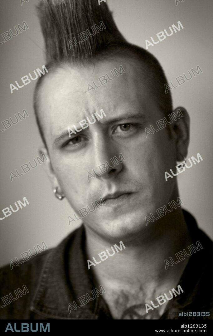 May 28, 2009 - Detroit, Michigan, USA - TOMMY KOFFIN, guitarist for the psychobilly punk band the Koffin Kats. Their latest album, 'Forever for Hire' is on their new label, Stomp Records. The Detroit-based band has toured relentlessly for the last three years, supporting their previous albums, 'Koffin Kats,' 'Inhumane,' 'Straying from the Pack,' and 'Drunk in the Daylight. 28/05/2009