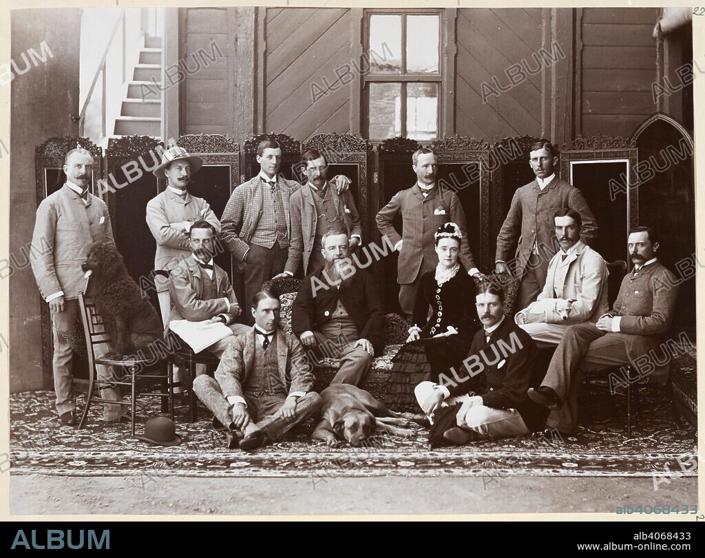 UNKNOWN. Group of Viceroy and Lady Ripon and staff, Simla. Lord and Lady Ripon seated in the centre. Lord William Beresford stands on the left with his dog Ponto seated on the chair in front. Next to Ponto is Henry Primrose, Private Secretary. Dunlop Smith Collection: Sir Charles Aitchison Album of Views in India and Burma. 1884. Photograph. Source: Photo 355/1(228).